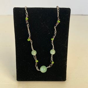 Z144NewCostume Jewelry-choker necklace that has green, purple, black and silver.